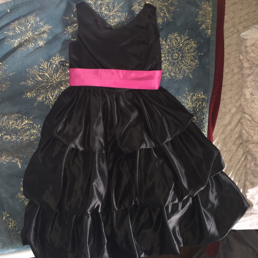 I am selling this dress because it does not fit